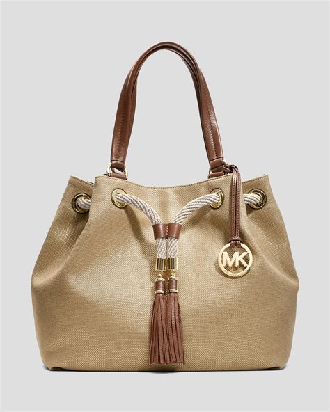 michael kors metallic pouch|Michael Kors metallic gold handbags.